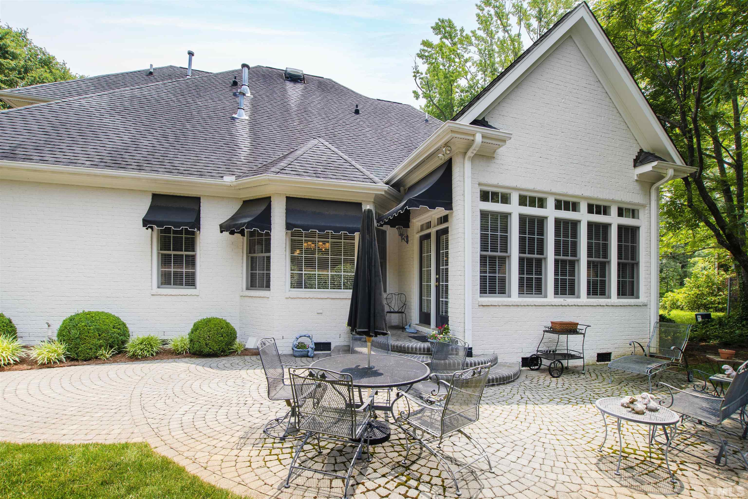 306 Lake Boone Trail Raleigh, NC 27608 - Photo 51 of 55 a front view of a house with garden