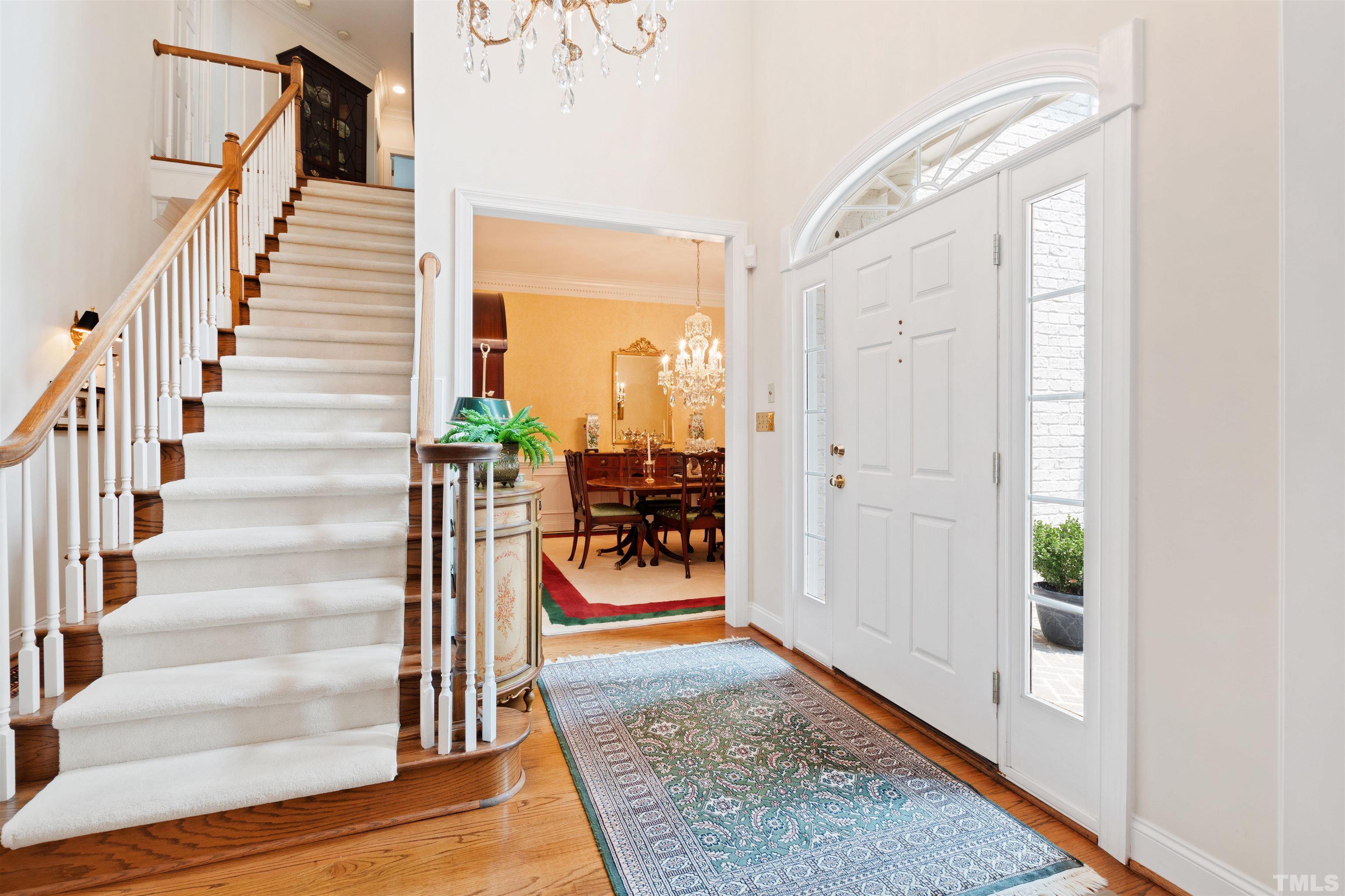306 Lake Boone Trail Raleigh, NC 27608 - Photo 6 of 55 a view of entryway and hall with wooden floor