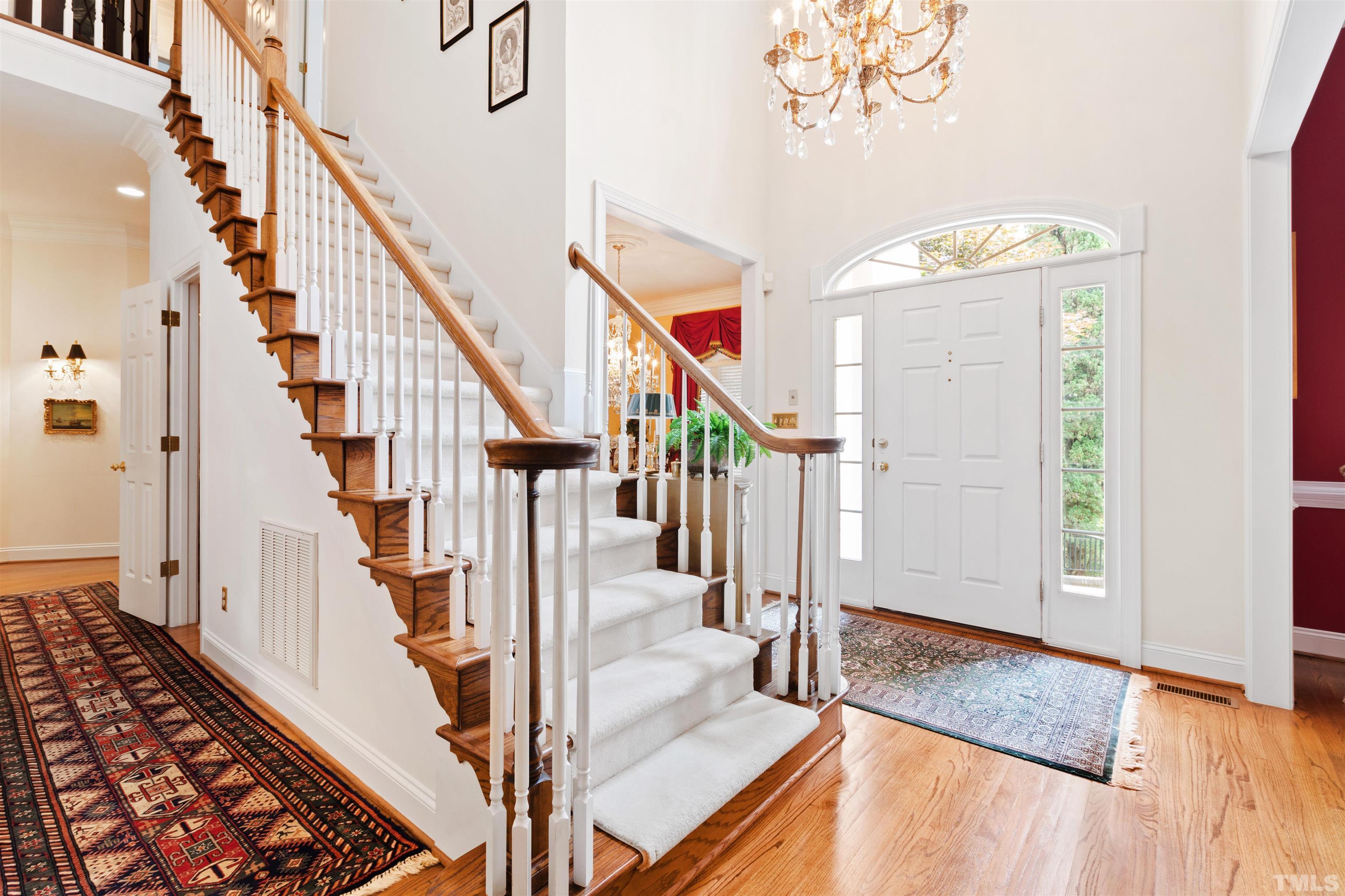 306 Lake Boone Trail Raleigh, NC 27608 - Photo 7 of 55 a view of an entryway with wooden floor