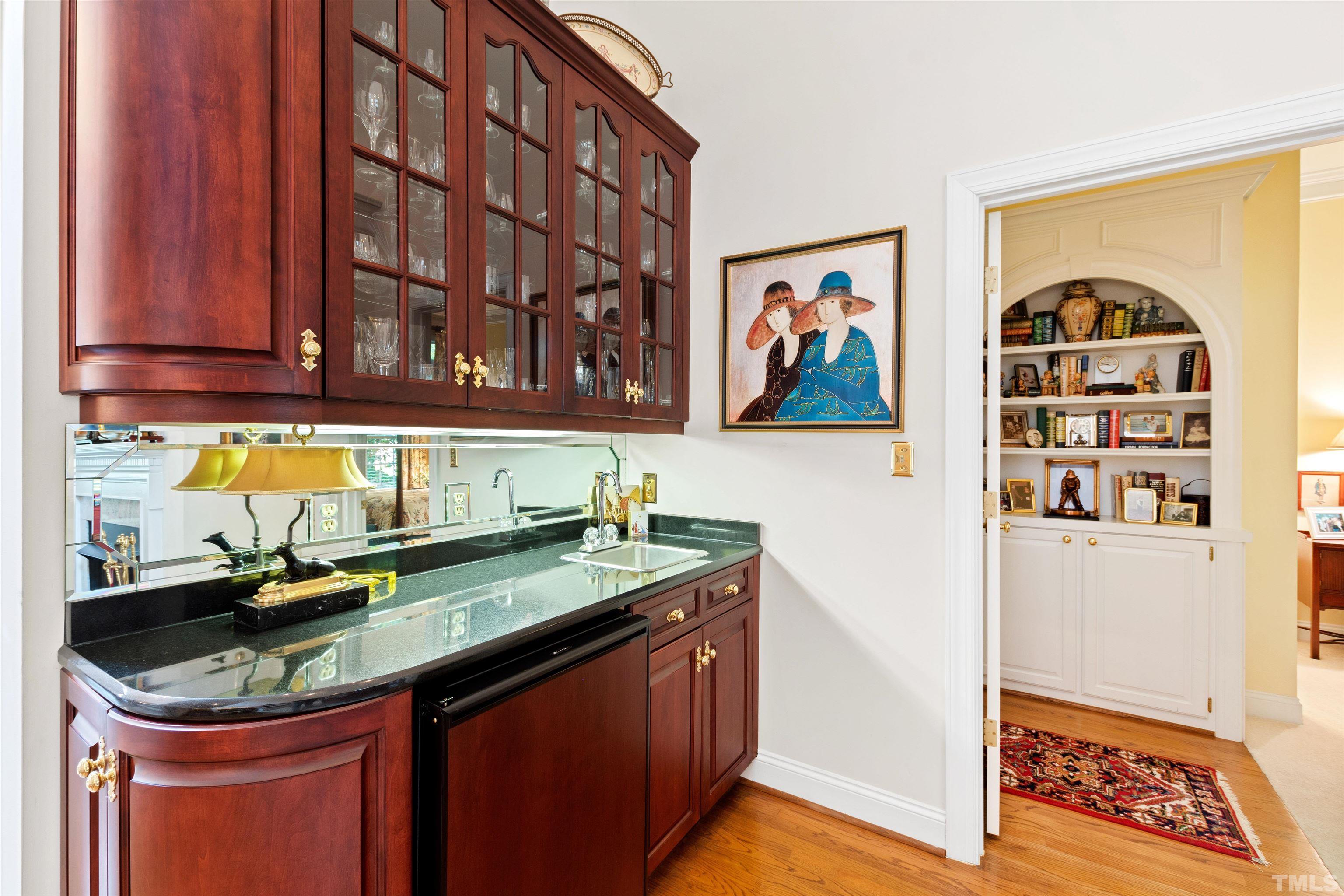 306 Lake Boone Trail Raleigh, NC 27608 - Photo 10 of 55 a kitchen with a sink a counter and cabinets