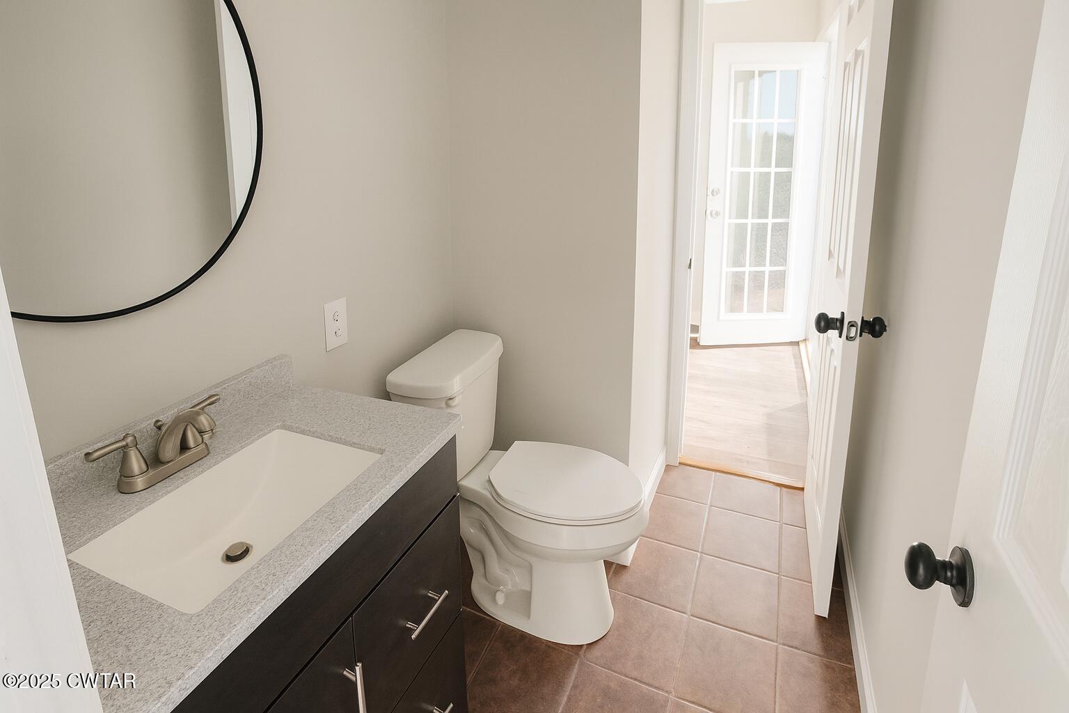 91 Currie Road Dyer, TN 38330 - Photo 11 of 13 a bathroom with a sink toilet and shower