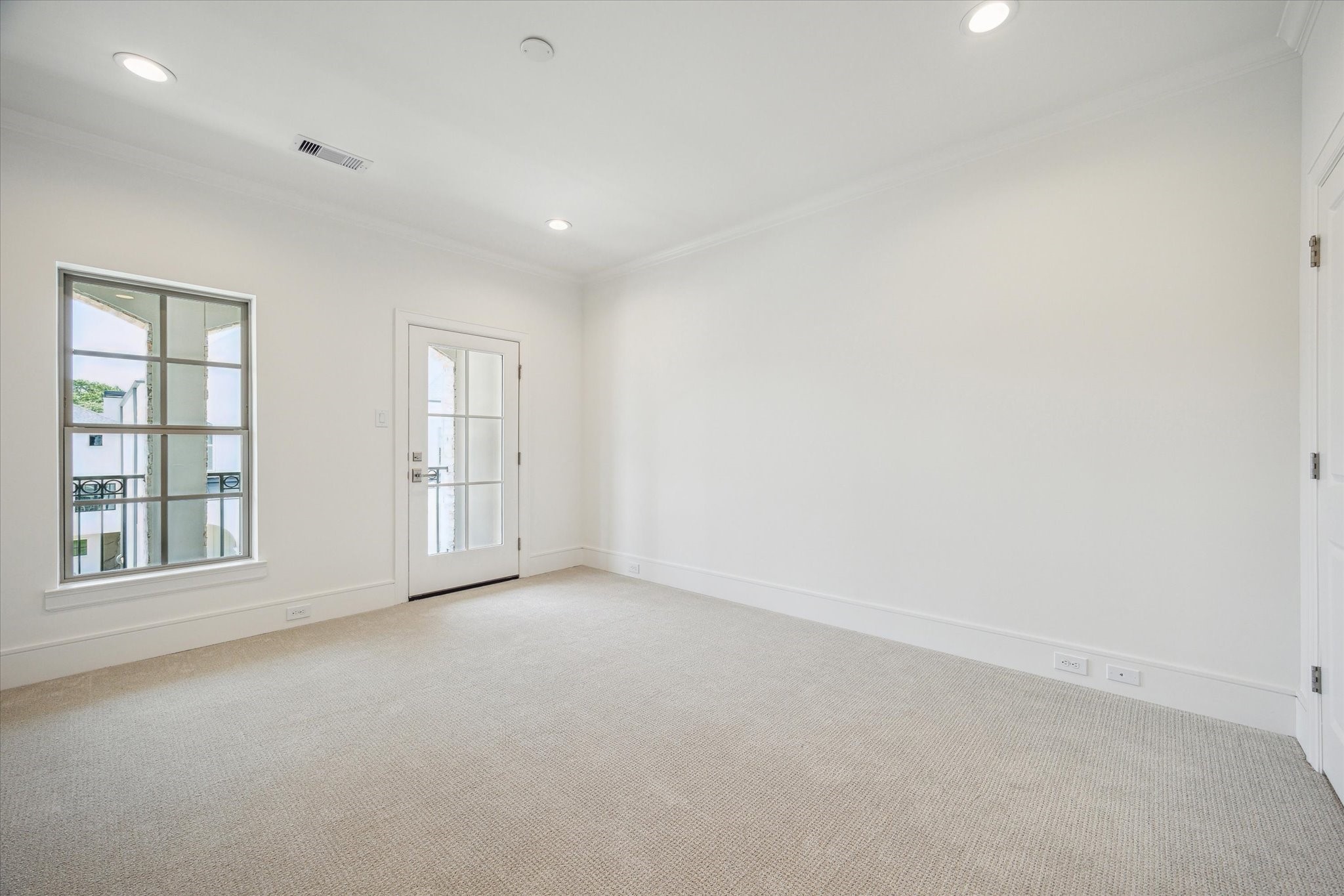 211 Sutton Row Place Houston, TX 77024 - Photo 17 of 25 an empty room with windows