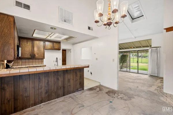 a bathroom with a shower and toilet