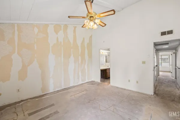 a bathroom with a shower and toilet