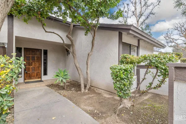 a garden view with fountain