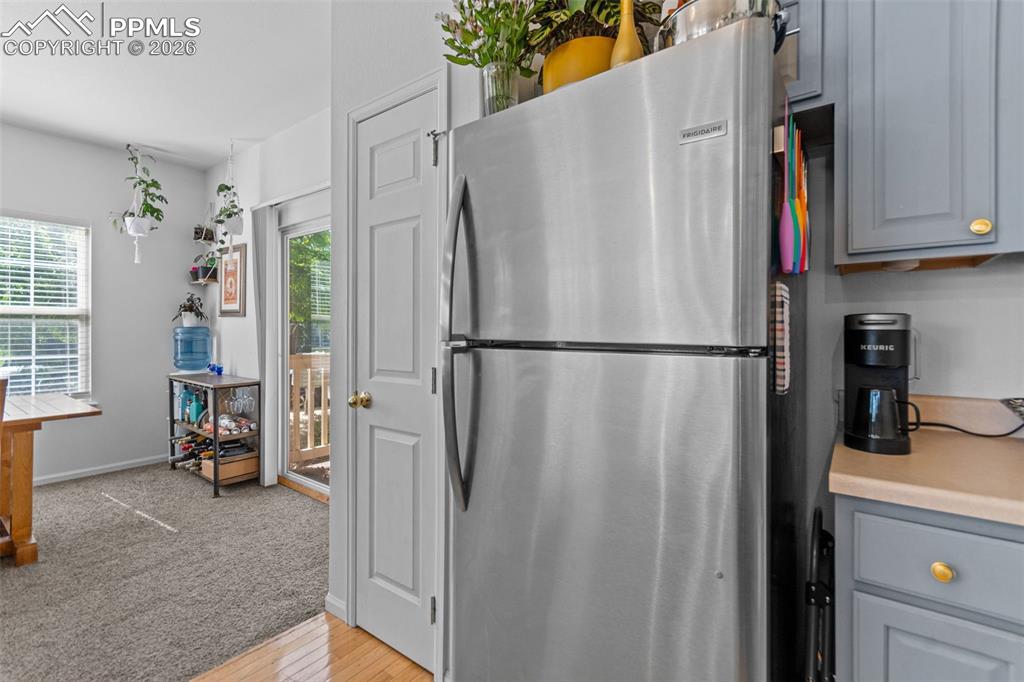 1563 Monterey Road, Unit B Colorado Springs, CO 80910 - Photo 12 of 27 a view of walk in closet with clothes and shoes