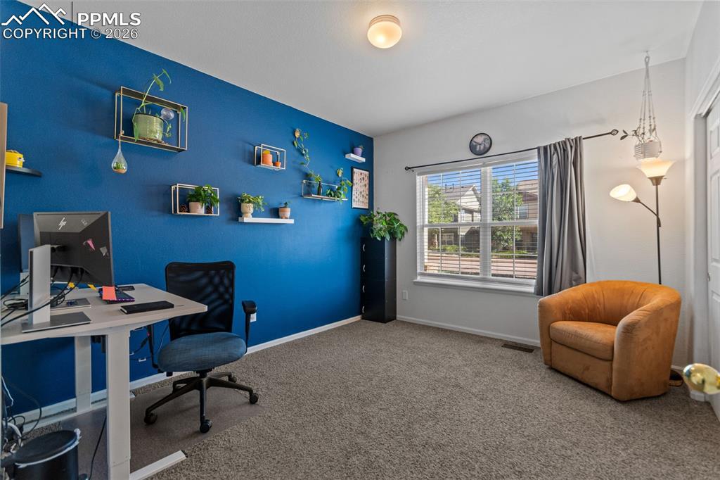 1563 Monterey Road, Unit B Colorado Springs, CO 80910 - Photo 23 of 27 a workspace with furniture and window