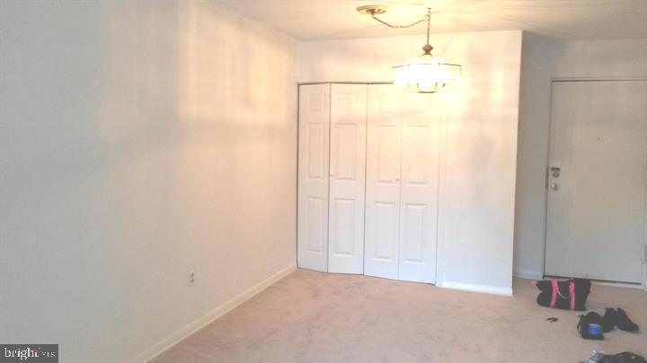 5814 Royal Ridge Drive, Unit F Springfield, VA 22152 - Photo 20 of 35 Living Room Closet