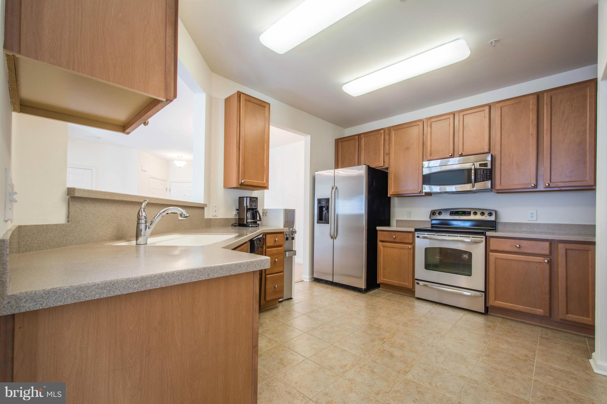7559 Stoney Run Drive, Unit 302 Hanover, MD 21076 - Photo 16 of 27 Kitchen