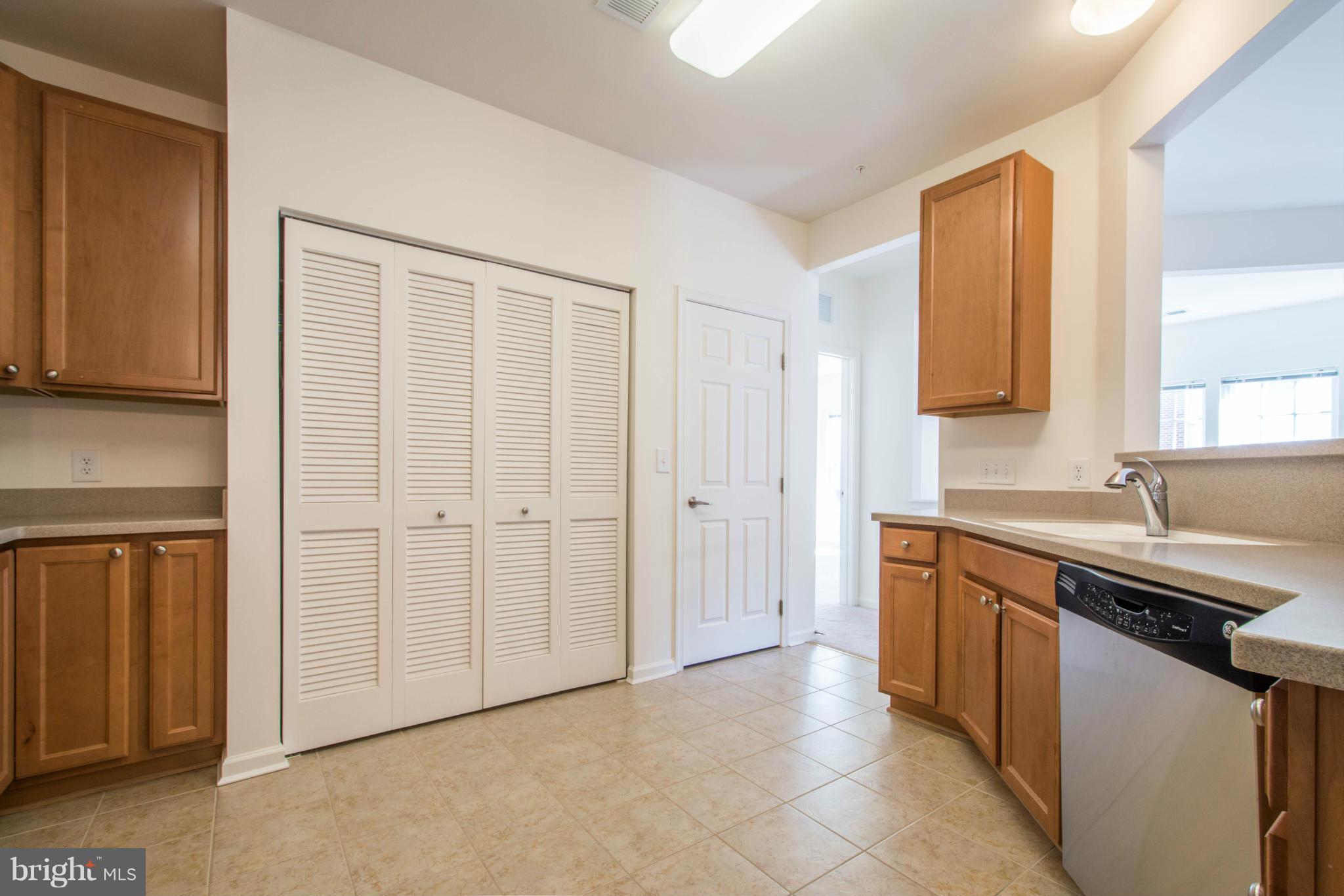 7559 Stoney Run Drive, Unit 302 Hanover, MD 21076 - Photo 19 of 27 Kitchen