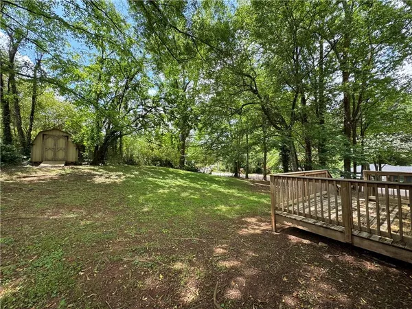 a view of backyard with green space