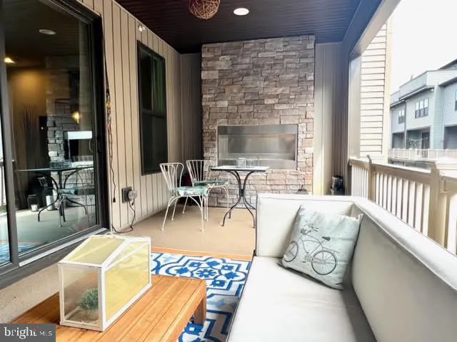 a view of a livingroom with furniture and a table