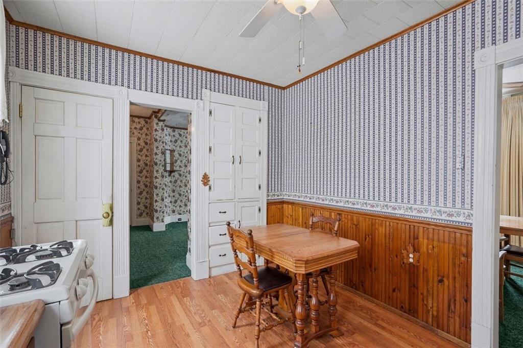 221 Kay Street Wampum, PA 16157 - Photo 19 of 39 a balcony with table and chairs