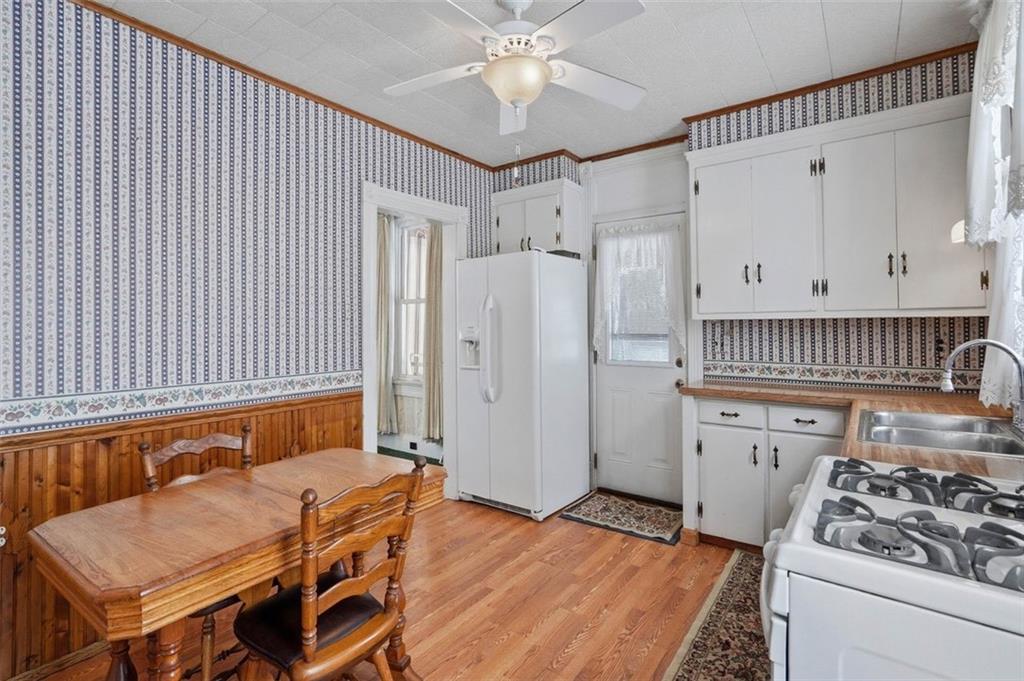 221 Kay Street Wampum, PA 16157 - Photo 20 of 39 a bedroom with a bed and a dresser