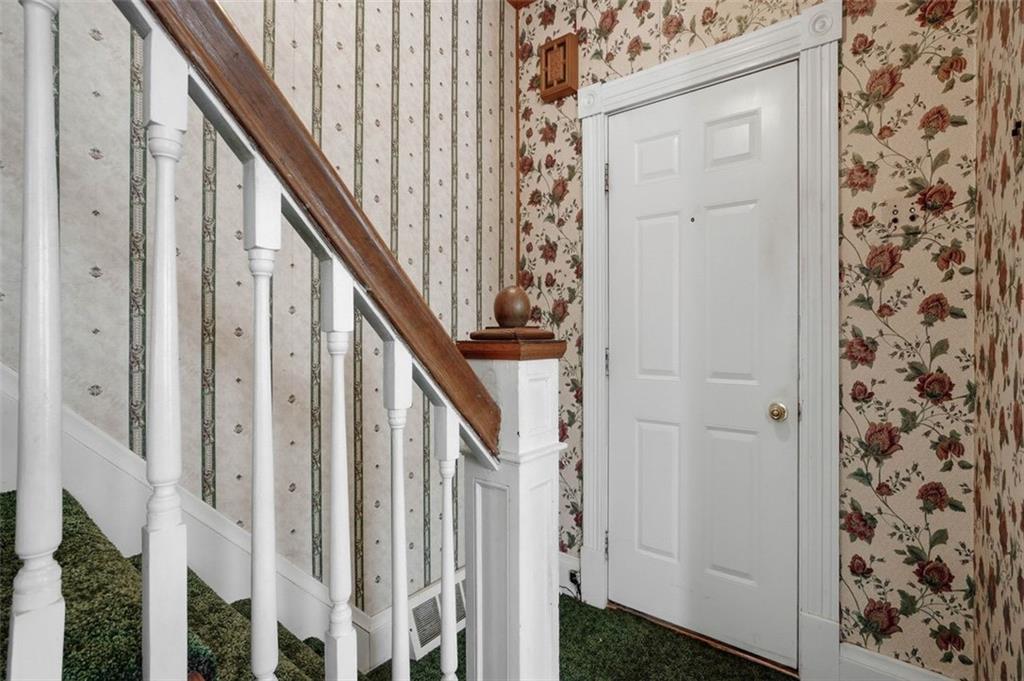 221 Kay Street Wampum, PA 16157 - Photo 7 of 39 a view of an entryway with staircase