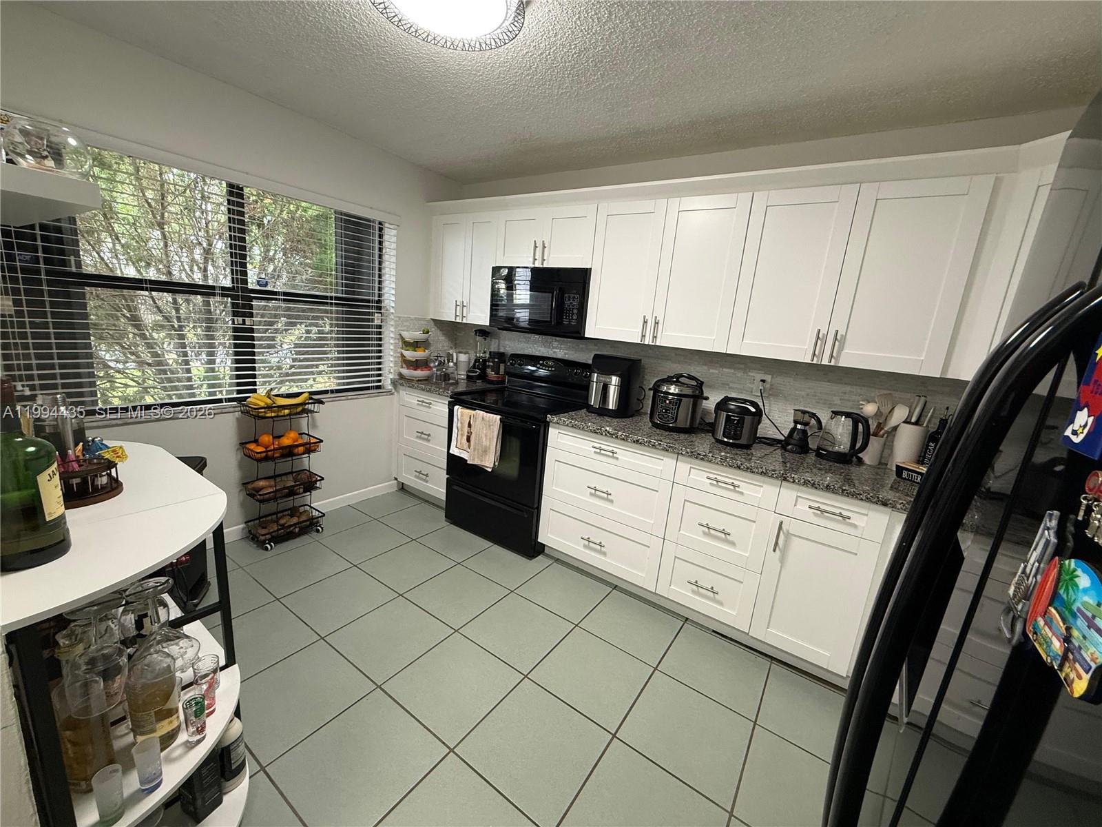 15022 Southwest 127th Place Miami, FL 33186 - Photo 5 of 14