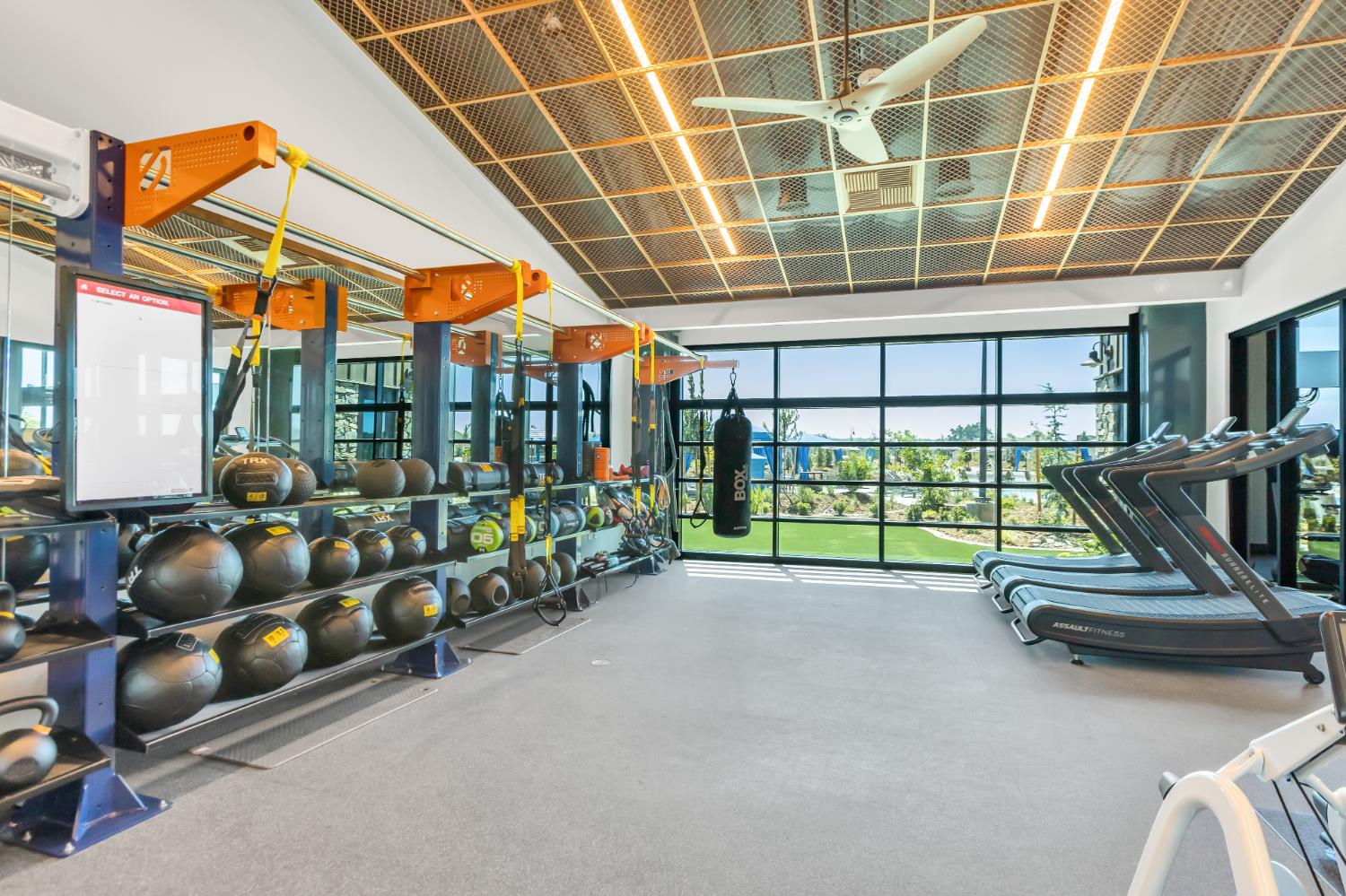 1623 Cascade Way Lincoln, CA 95648 - Photo 20 of 31 a room with gym equipment and large windows