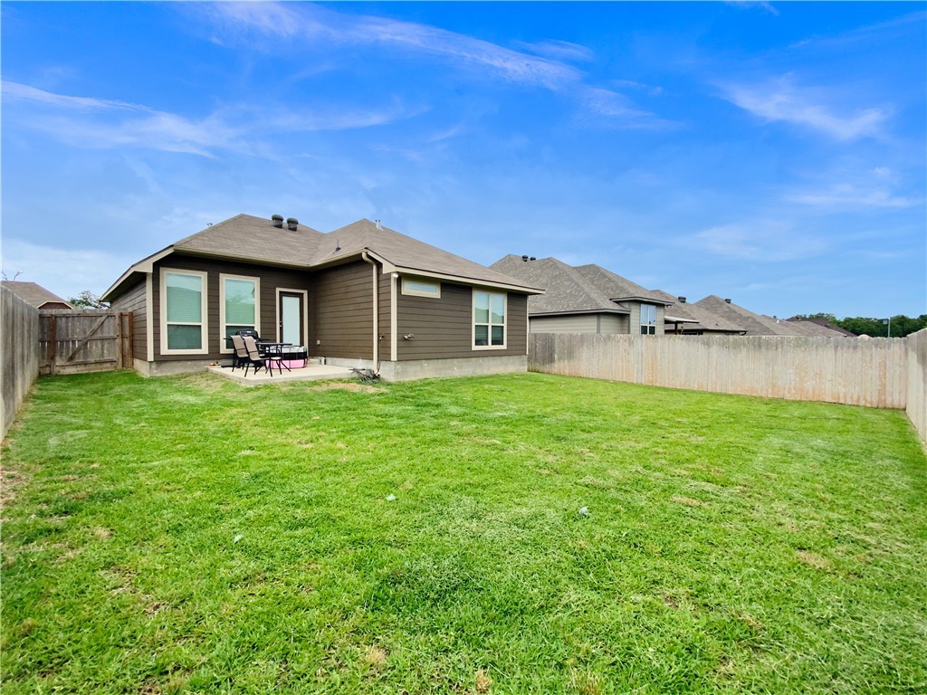 2106 Stubbs Drive Bryan, TX 77807 - Photo 10 of 11 a front view of a house with garden