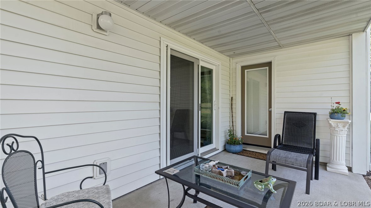 100 Osage Hills Road, Unit 201 Lake Ozark, MO 65049 - Photo 39 of 64 Back Patio overlooking golf course