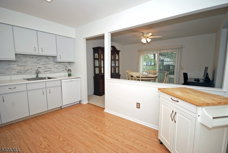 10 Apache Way Somerville, NJ 08876 - Photo 13 of 37 a kitchen with a sink and cabinets