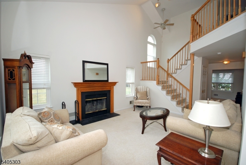 10 Apache Way Somerville, NJ 08876 - Photo 8 of 37 a living room with furniture and a fireplace