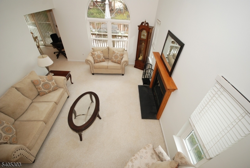 10 Apache Way Somerville, NJ 08876 - Photo 10 of 37 a picture of a room with furniture and a window