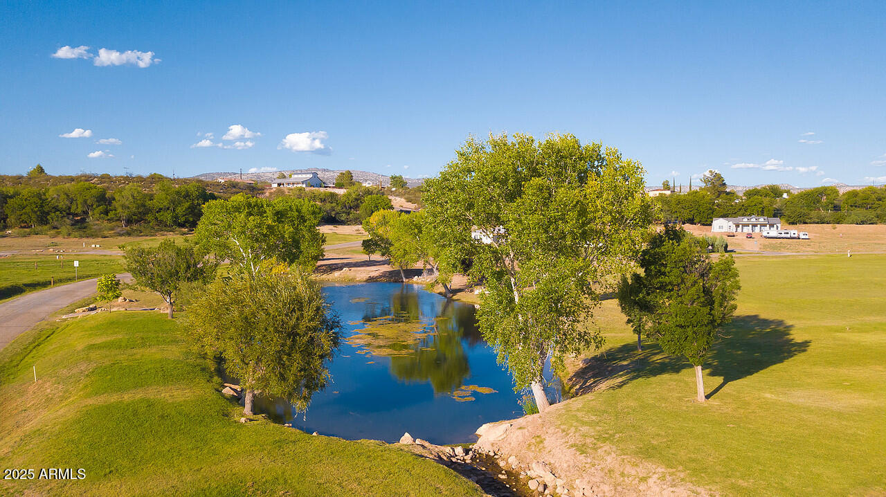 275 South Bonito Ranch Loop, Unit 25 Cornville, AZ 86325 - Photo 20 of 27 a view of a swimming pool and an ocean view