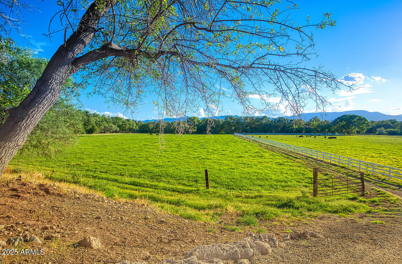 275 South Bonito Ranch Loop, Unit 25 Cornville, AZ 86325 - Photo 21 of 27 a view of a lake with a yard