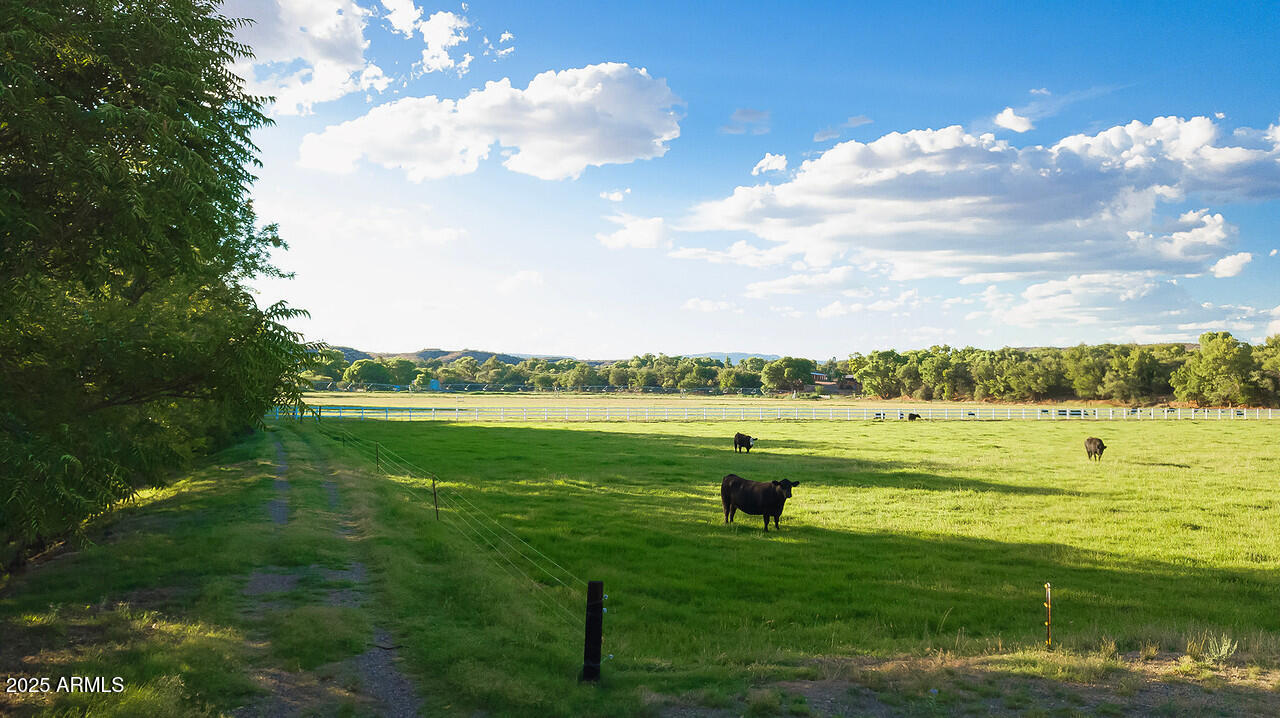 275 South Bonito Ranch Loop, Unit 25 Cornville, AZ 86325 - Photo 25 of 27 a view of a lake with a big yard
