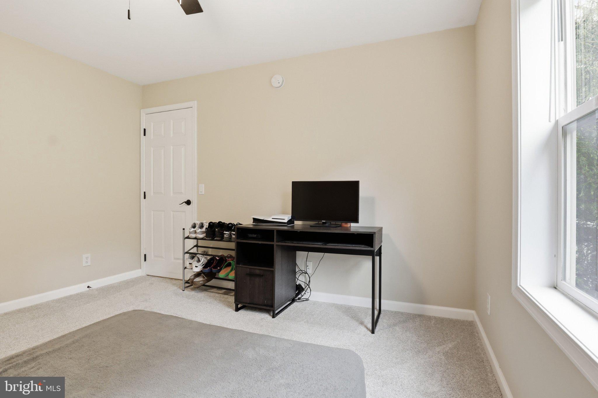 491 Garvine Mill Road Fawn Grove, PA 17321 - Photo 15 of 47 a view of a workspace with furniture and a window