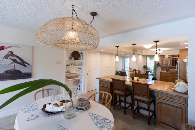 a view of a bathroom with a shower and a toilet