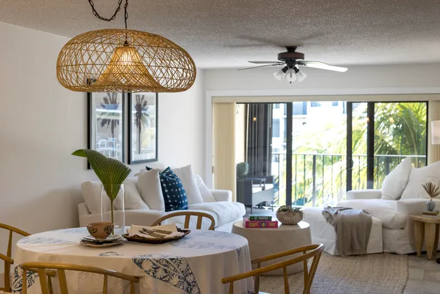 a bedroom with a bed and a mirror