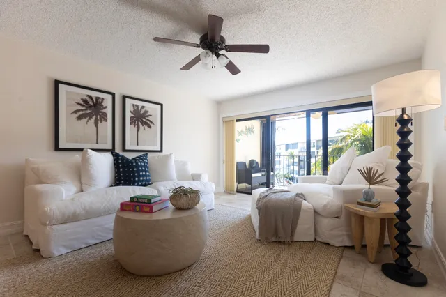 a bed room with a bed and a chair