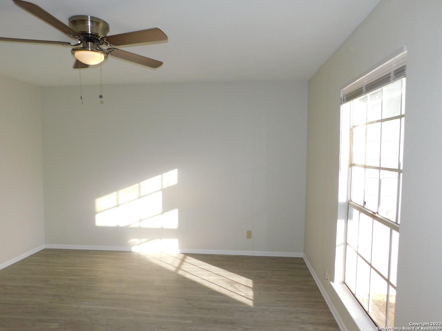 923 Spring Park Drive San Antonio, TX 78227 - Photo 12 of 30 a view of an empty room with a window