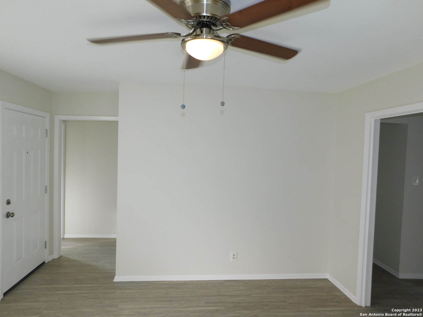923 Spring Park Drive San Antonio, TX 78227 - Photo 13 of 30 a view of an empty room with wooden floor