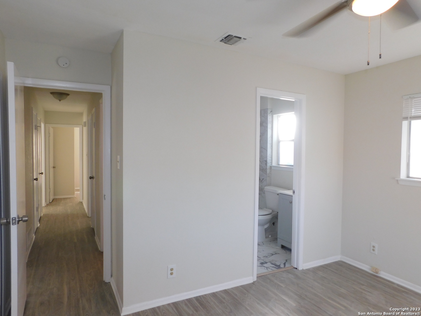 923 Spring Park Drive San Antonio, TX 78227 - Photo 15 of 30 a view of a bathroom with wooden floor