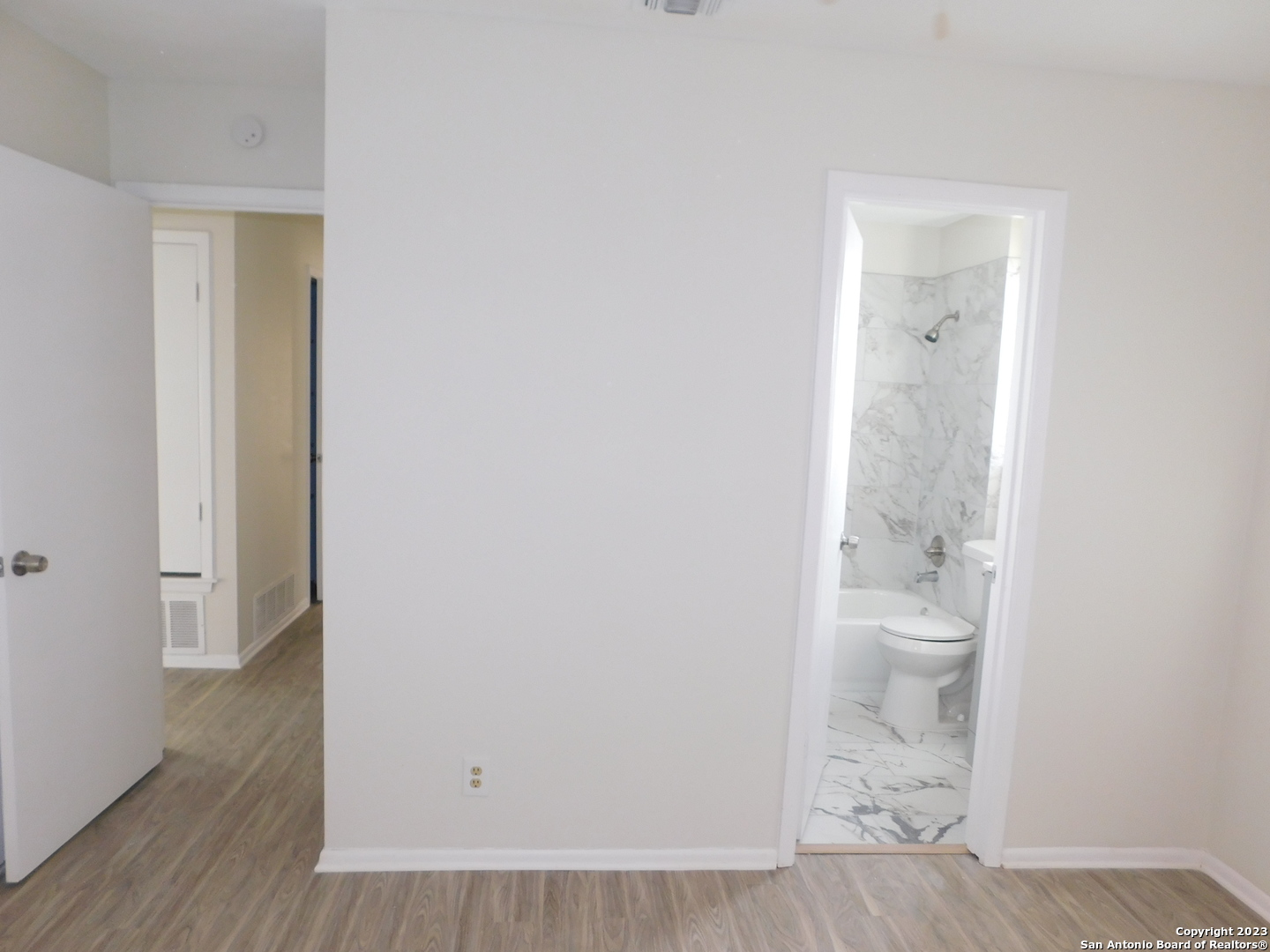 923 Spring Park Drive San Antonio, TX 78227 - Photo 16 of 30 a bathroom with a toilet and a shower