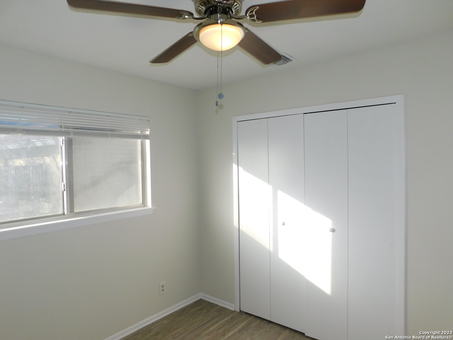 923 Spring Park Drive San Antonio, TX 78227 - Photo 19 of 30 a view of an empty room with a window