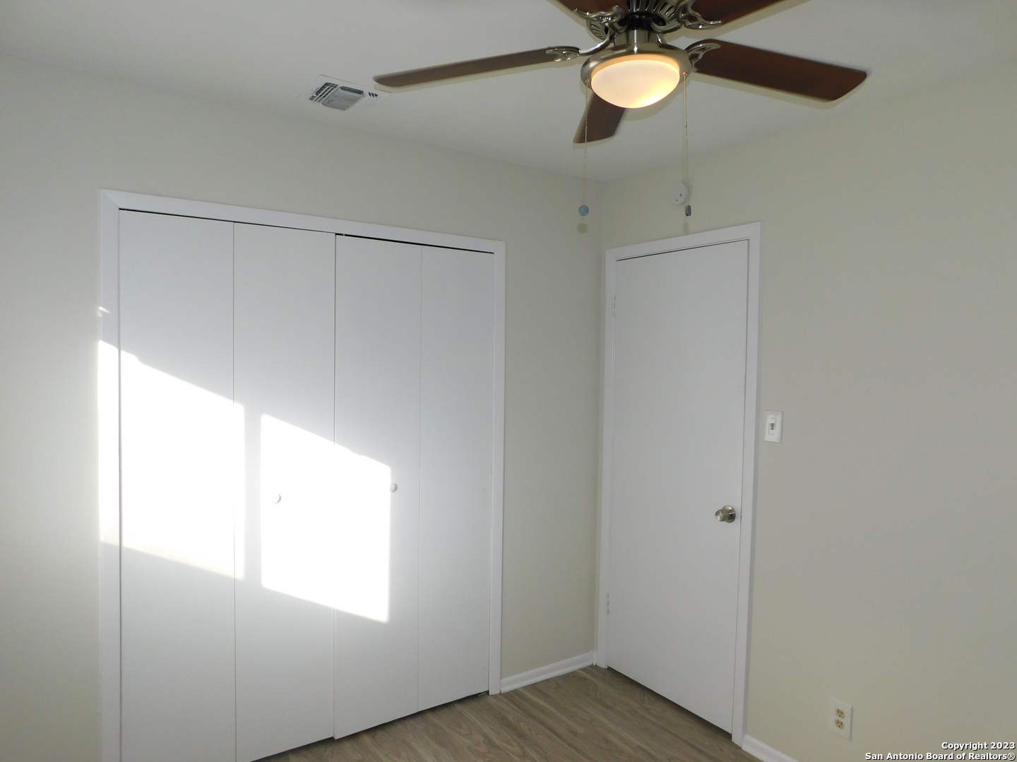 923 Spring Park Drive San Antonio, TX 78227 - Photo 20 of 30 a view of room with window and ceiling fan