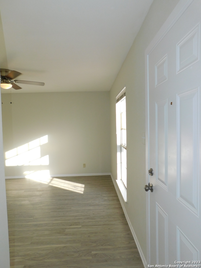 923 Spring Park Drive San Antonio, TX 78227 - Photo 2 of 30 a view of an empty room and window