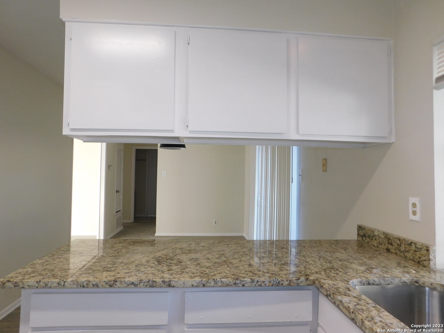 923 Spring Park Drive San Antonio, TX 78227 - Photo 8 of 30 a bathroom with a granite countertop sink and a mirror