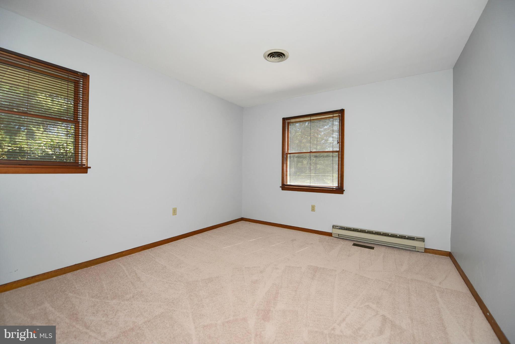 911 Ridge Road Rising Sun, MD 21911 - Photo 27 of 30 an empty room with windows