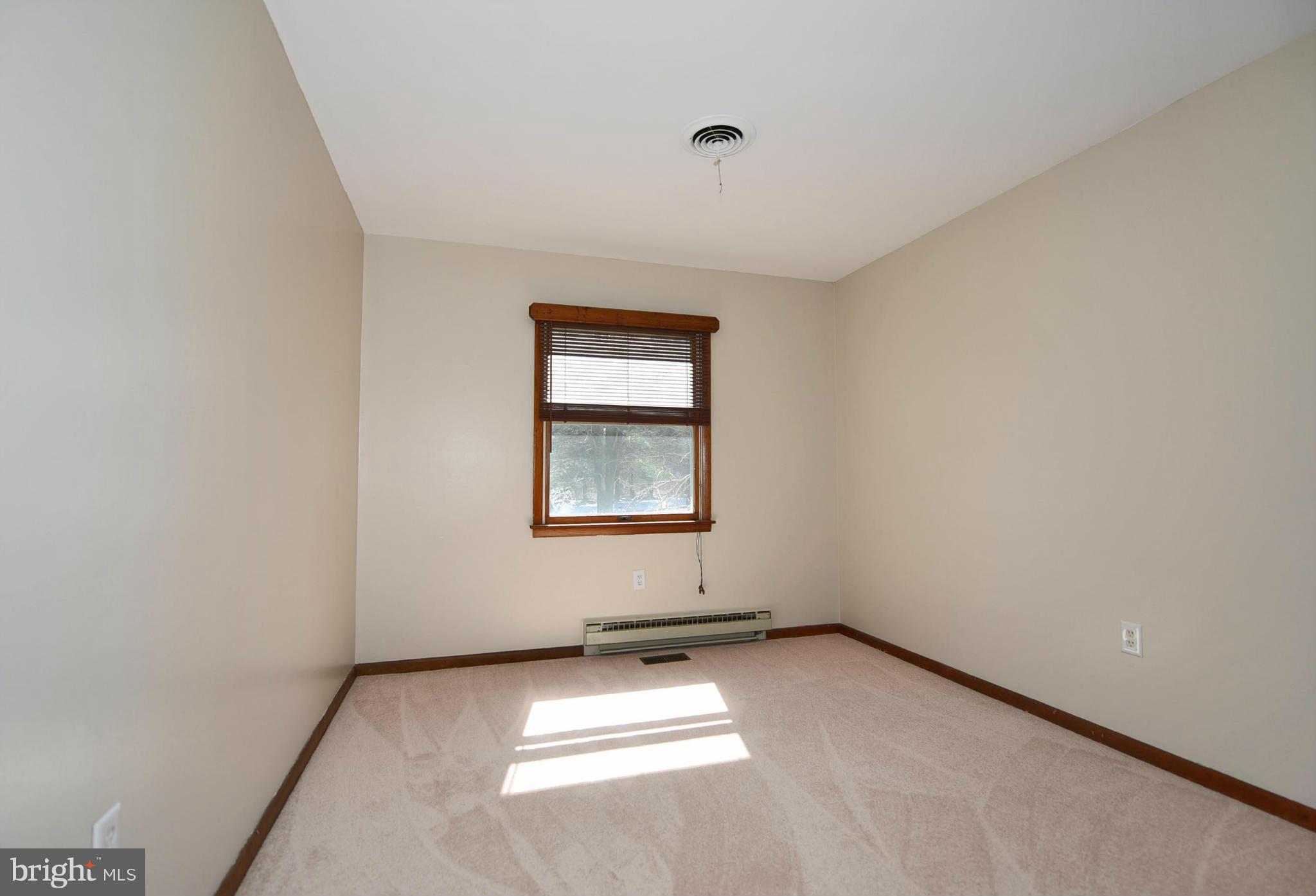 911 Ridge Road Rising Sun, MD 21911 - Photo 29 of 30 an empty room with windows