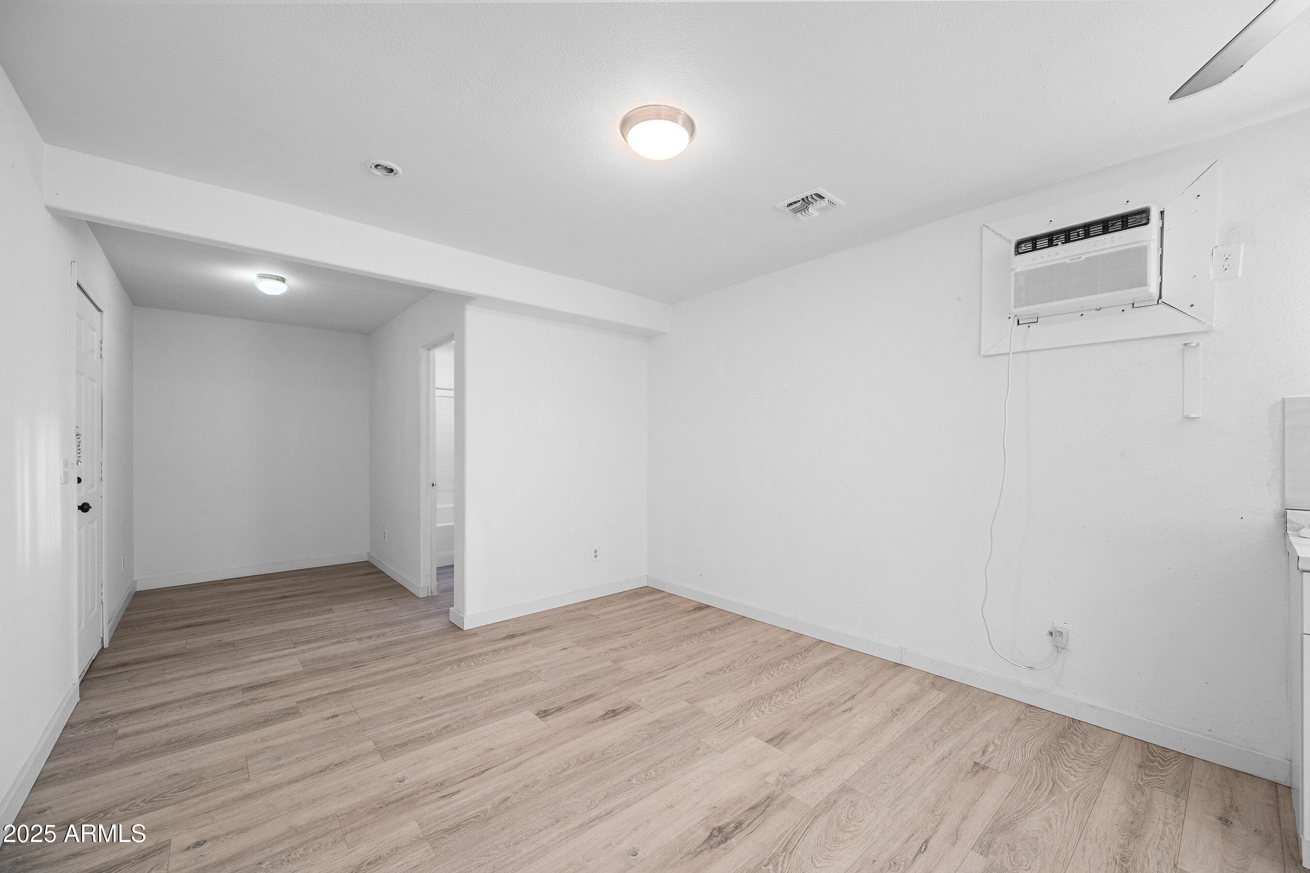 2057 East 10th Street Tempe, AZ 85281 - Photo 20 of 26 wooden floor in an empty room