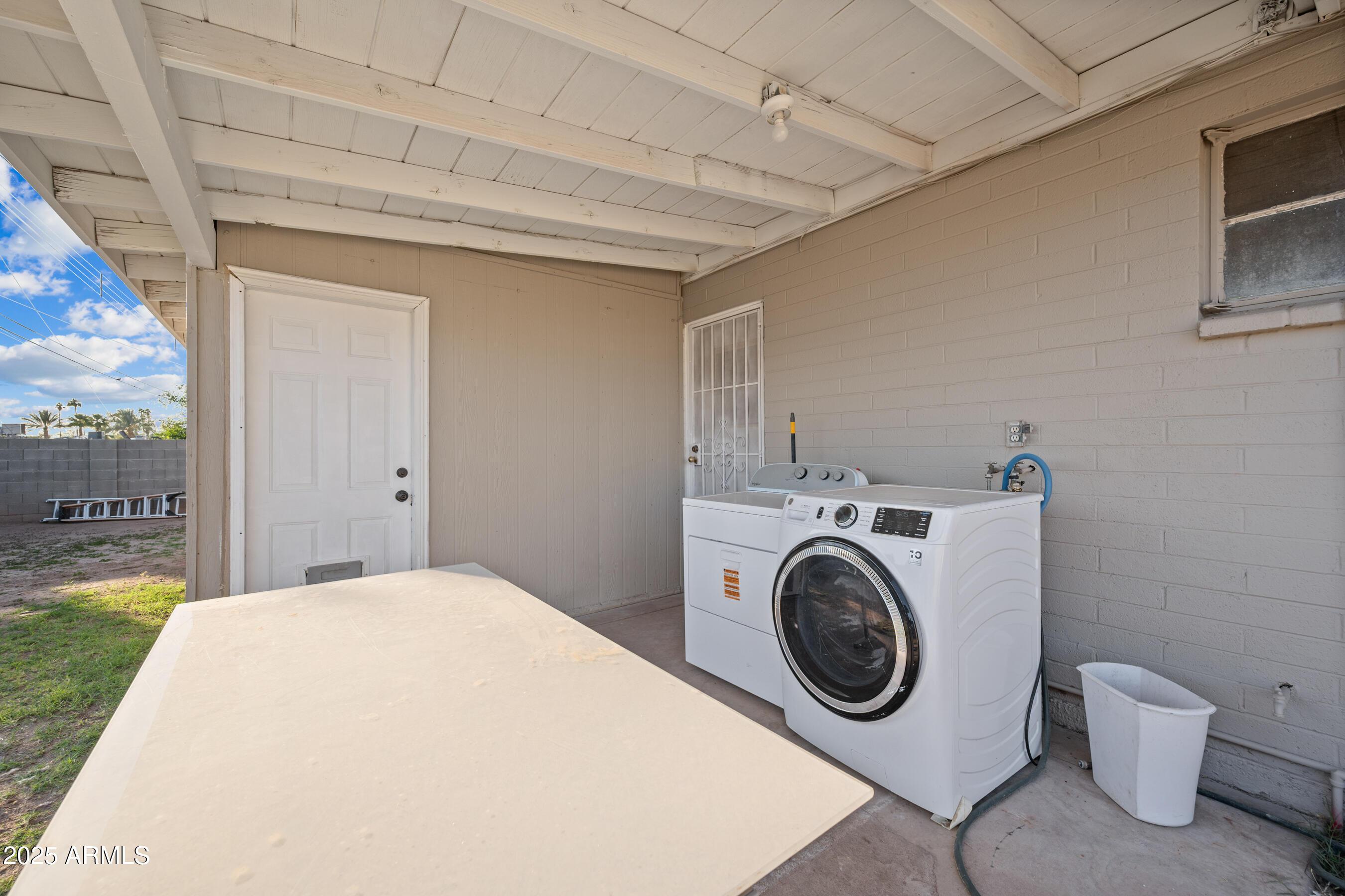 2057 East 10th Street Tempe, AZ 85281 - Photo 25 of 26 a utility room with dryer and washer