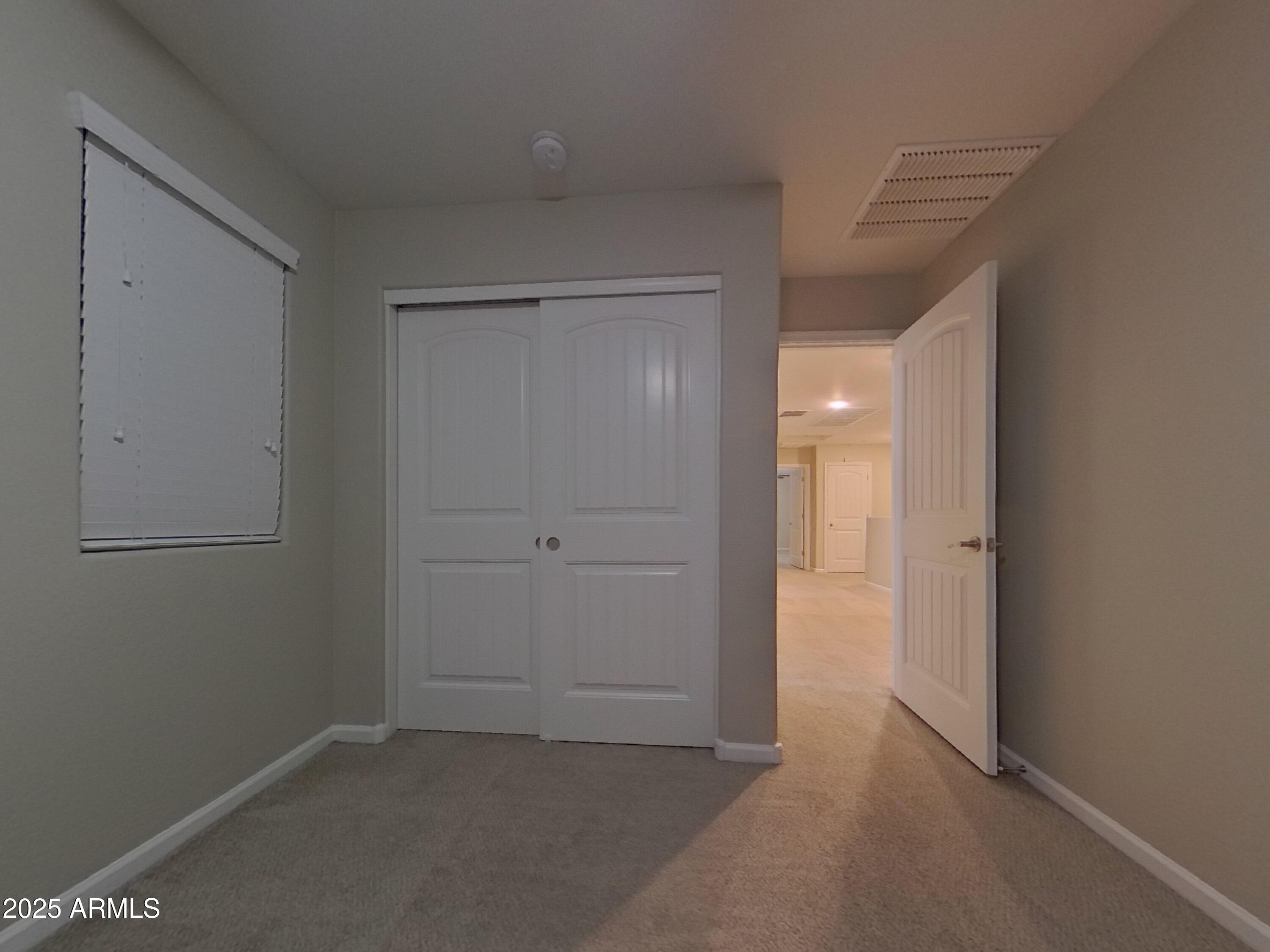 12578 West Steed Ridge Peoria, AZ 85383 - Photo 12 of 17 a view of an empty room