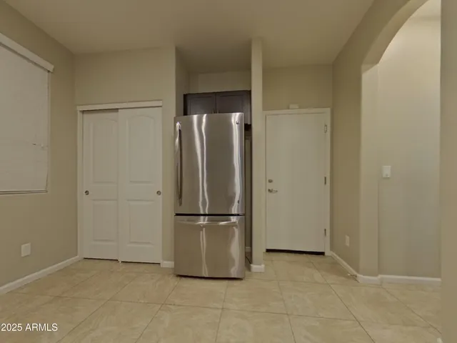 a kitchen with a sink cabinets and stainless steel appliances