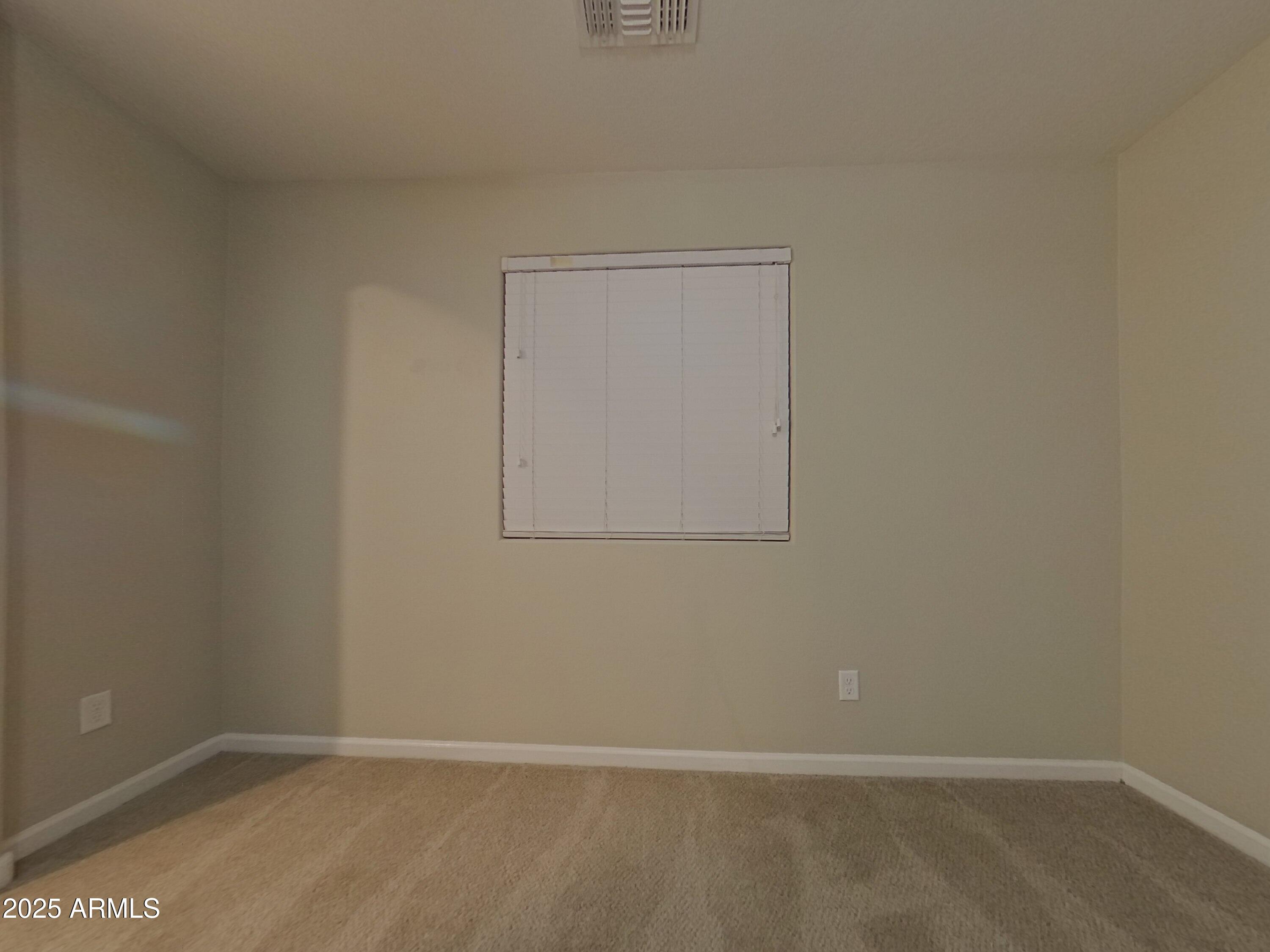 12578 West Steed Ridge Peoria, AZ 85383 - Photo 7 of 17 a view of an empty room