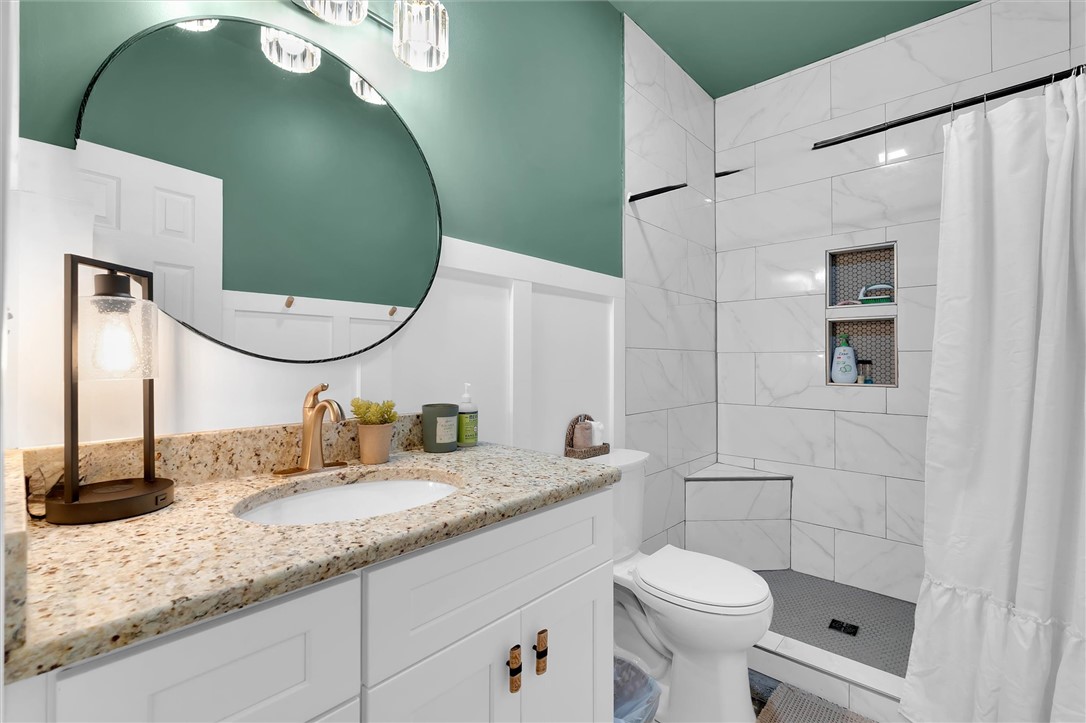 117 Winding Creek Road Anderson, SC 29621 - Photo 22 of 42 This bathroom offers a contemporary design with a practical and aesthetically pleasing layout.