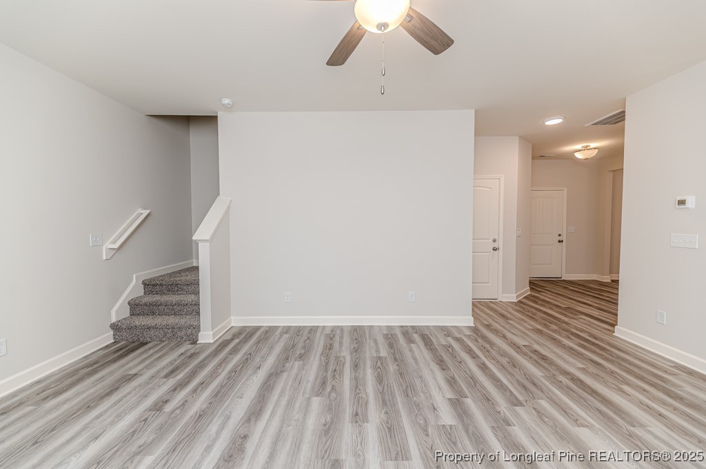 87 Onslow Court Spring Lake, NC 28390 - Photo 15 of 33 a view of a livingroom with wooden floor